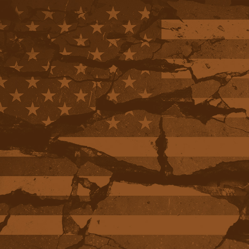 A brown american flag with cracked paint on it.